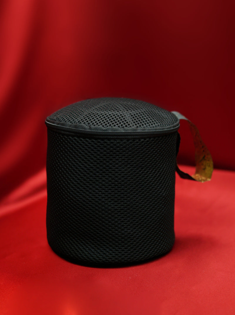 Frederick’s of Hollywood Bra Wash Bag: a cylindrical black mesh laundry bag with a zippered lid and a small side handle.