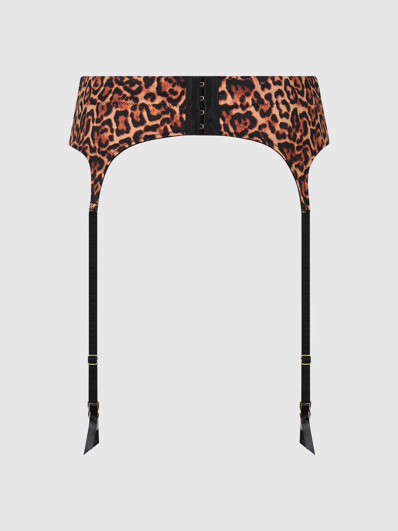 The Rising Star Liquid Satin Garter by Frederick's of Hollywood, featuring a leopard print design with black adjustable straps and metal clips, is displayed on a plain light background.