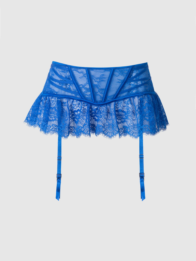 The Adelaide Satin & Lace Garter Belt by Frederick's of Hollywood features blue lace with sheer floral details, structured panels, and flexible boning. Two adjustable straps hang down, set against a plain light gray background.