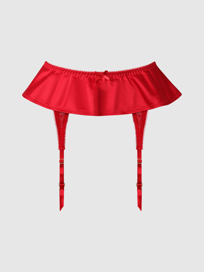 The Marilyn Monroe Lace & Satin Skirted Garter Belt by Frederick’s of Hollywood features a flared skirted silhouette in red, adorned with a small central bow, lace accents, and adjustable straps. It is displayed against a plain light gray background.
