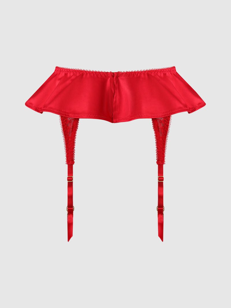 The Marilyn Monroe Lace & Satin Skirted Garter Belt by Frederick’s of Hollywood, featuring red satin fabric, lace details, and adjustable straps, is displayed against a plain light gray background.