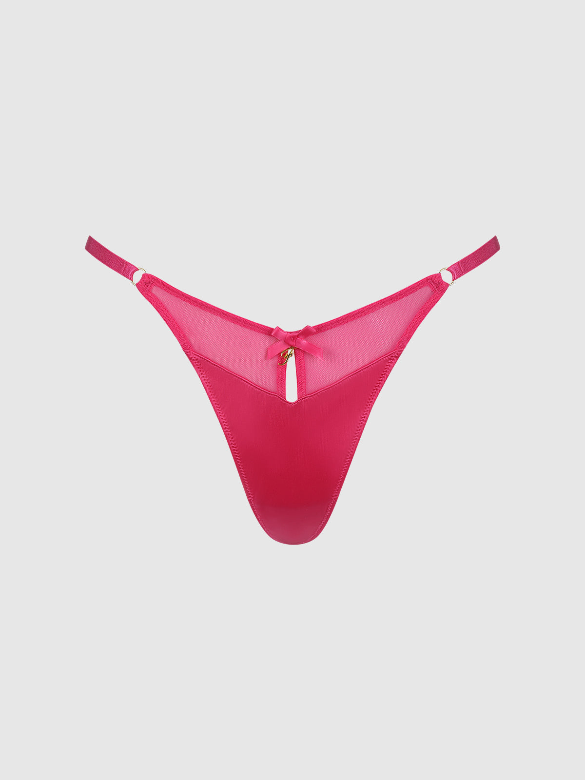 The Scarlett Mesh G-String by Frederick's of Hollywood is a bright pink thong with bold mesh panels, thin adjustable side straps, gold ring accents, and a small bow with a keyhole cutout at the front, shown on a plain light background.