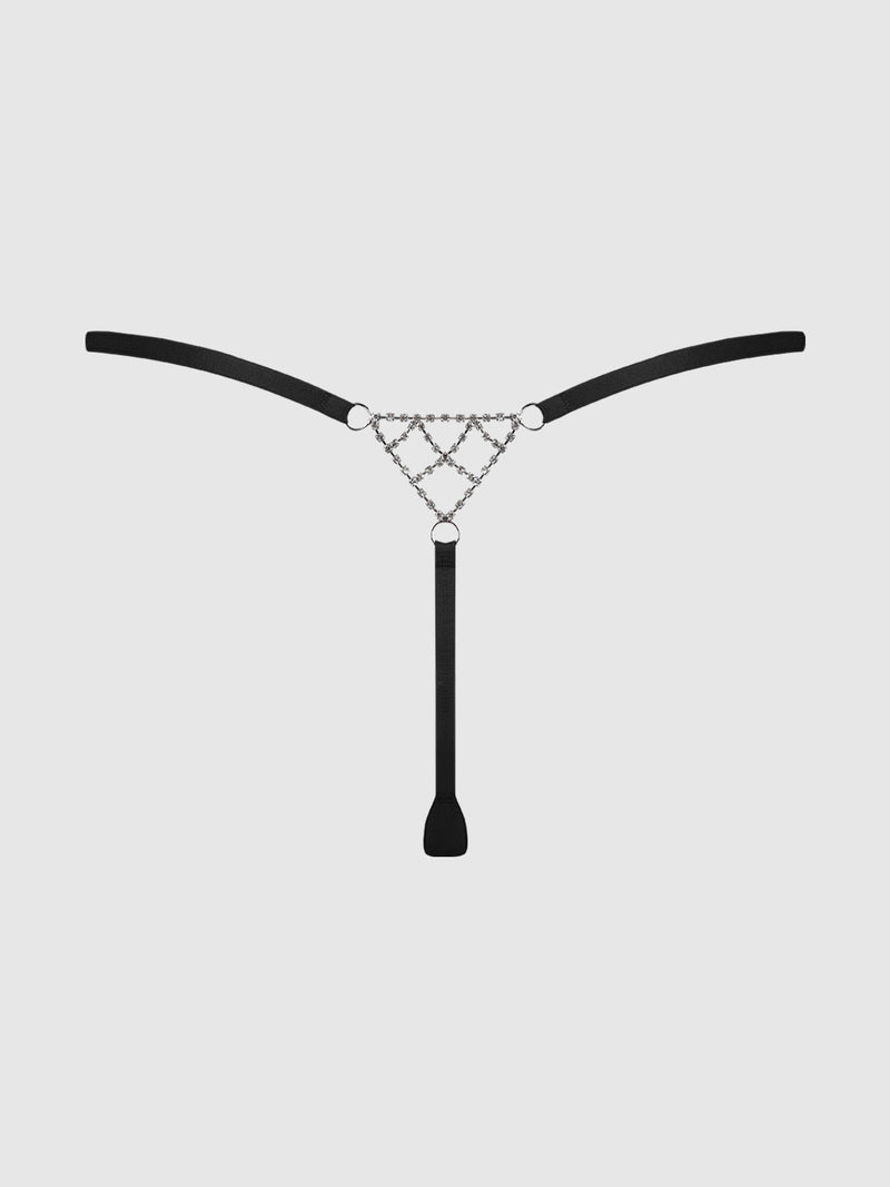 The Rising Star Rhinestone Net Back G-String by Frederick's of Hollywood features sleek black elastic straps, silver chain details, a leather-like patch, and sparkling rhinestones, all displayed on a plain light gray background.
