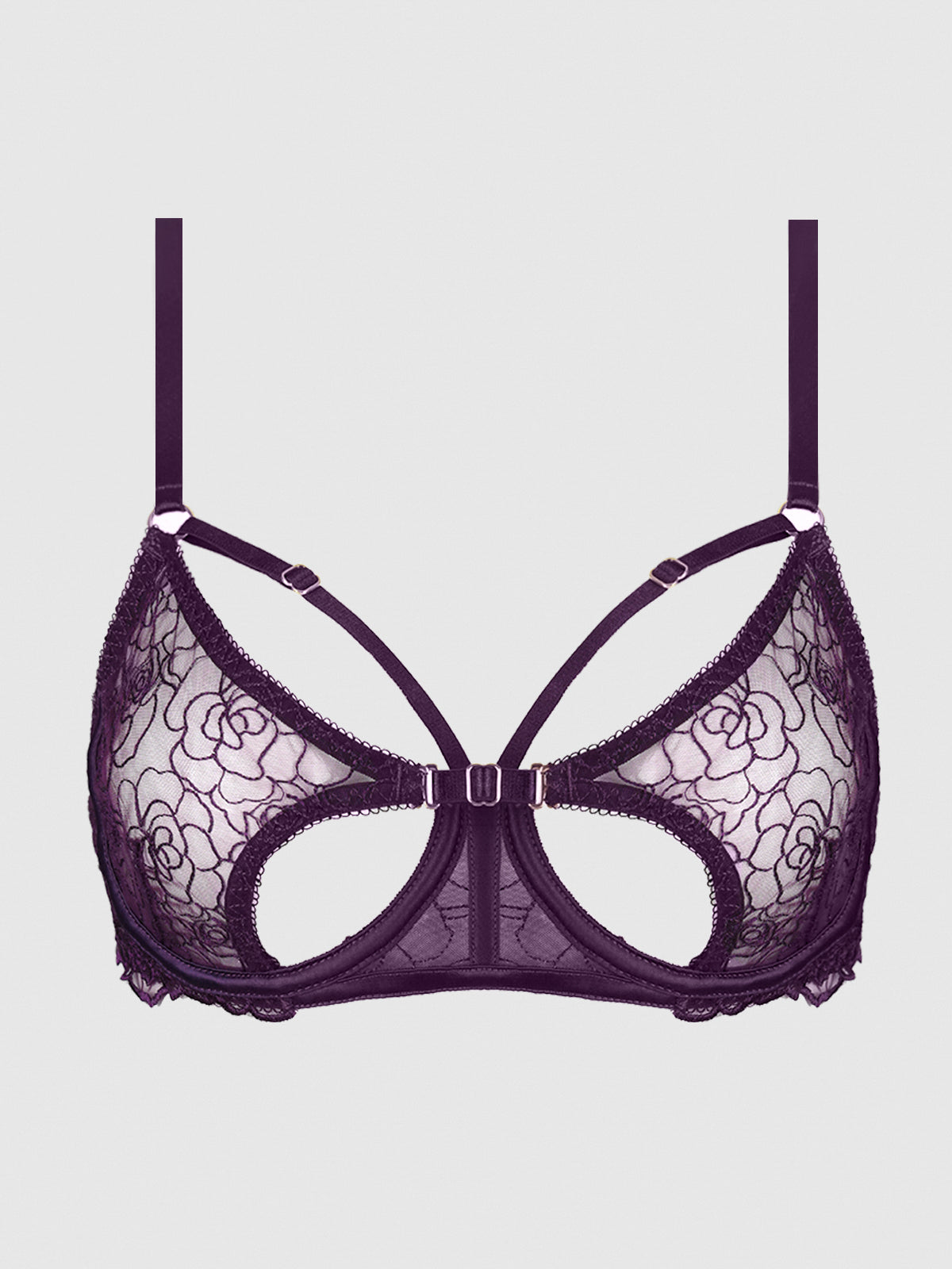 The Melrose Strappy Cutout Bra by Frederick's of Hollywood features purple floral lace, cut-out cup details, adjustable shoulder straps, and decorative chest straps, shown against a plain light backdrop.