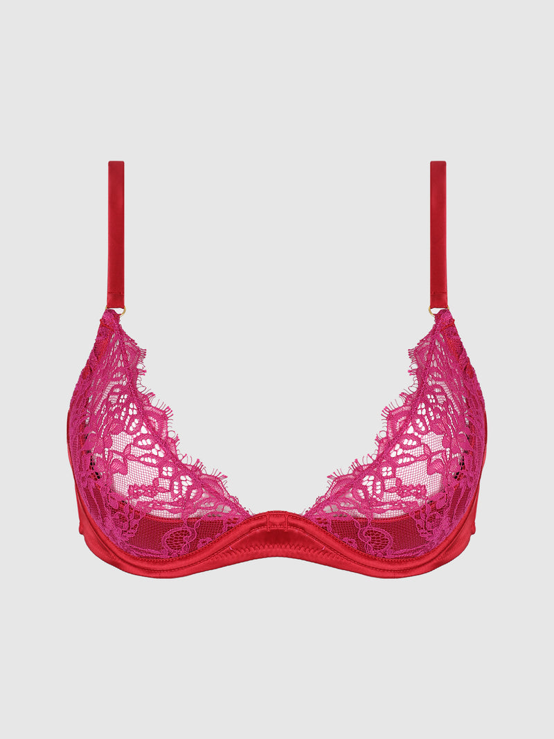 The Rosalind Lace Cup Bra With Satin Half Cup by Frederick’s of Hollywood features red push-up half cups with pink lace, adjustable straps, and an underwire design, shown on a plain light gray background—a truly stunning lingerie piece.