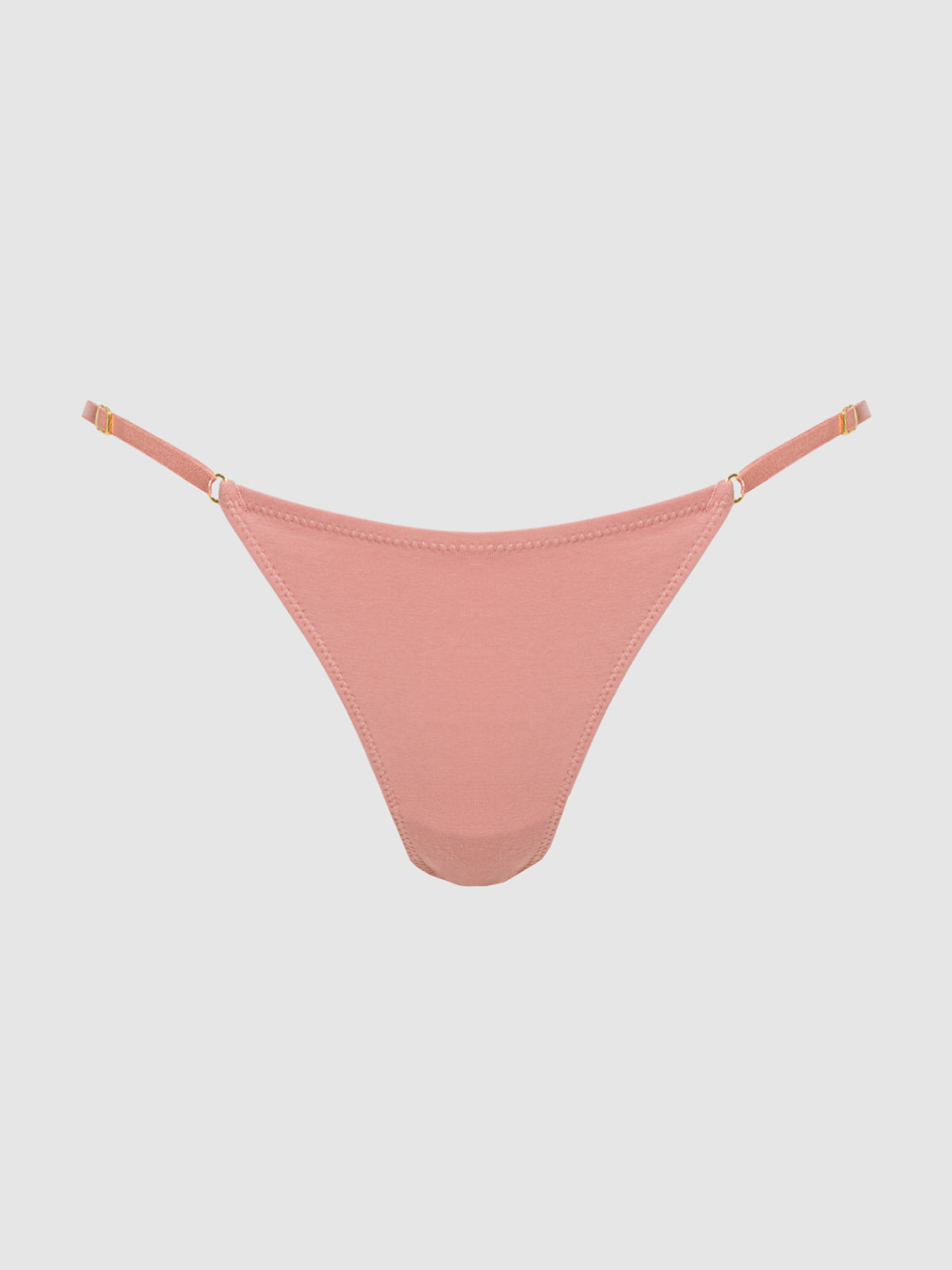 The Frederick's of Hollywood Bailey Stretch Cotton Bikini in blush pink features adjustable side straps for a custom fit, displayed against a plain light gray background.