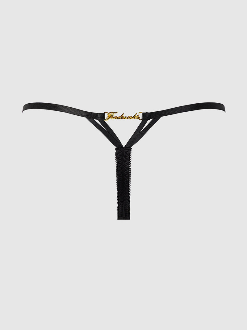 The Neev Lace G-String by Frederick's of Hollywood features black strappy design, high-shine Neev fabric, and gold-tone Fauchon lettering at the front center, shown on a plain grey background.