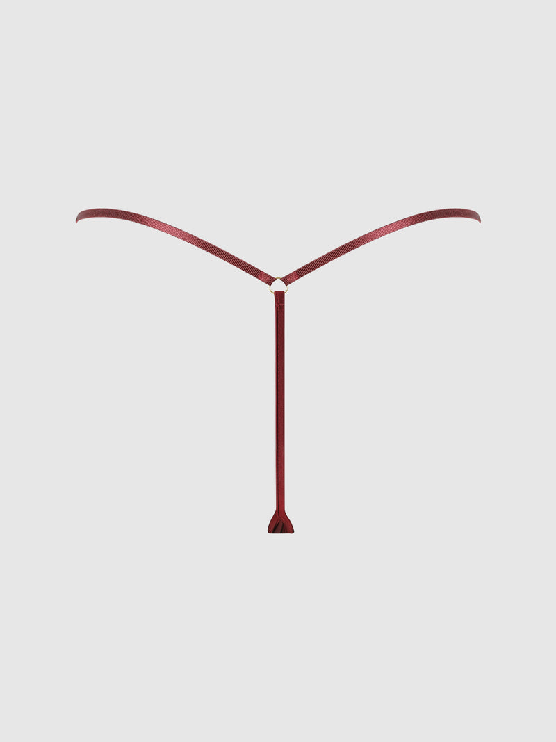 The Frederick’s of Hollywood Emery Liquid Satin & Chain G-String is showcased against a plain light gray background, featuring a minimalist maroon design with delicate chain details.