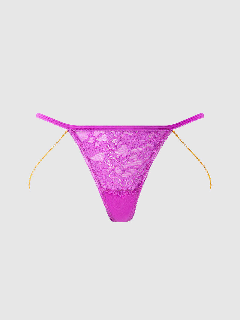 The Arianna Lace & Chains G-String by Frederick's of Hollywood features sexy bright pink lace and delicate gold chain details on thin straps, showcased against a plain light gray background.