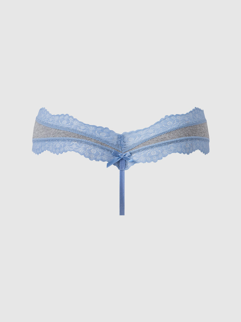The Jenna Micro G-String by Frederick's of Hollywood features delicate blue lace, a silky-soft satin ribbon bow at the center, sheer lace trim, and a long trailing ribbon. Displayed against a plain white background.