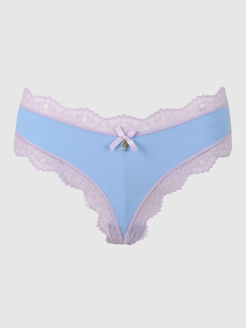 The Jenna Micro G-String by Frederick's of Hollywood features light blue silky-soft microfiber, delicate micro lace, and a small bow with charm at the front. Designed for comfort and stretch, it's shown on a plain white background.