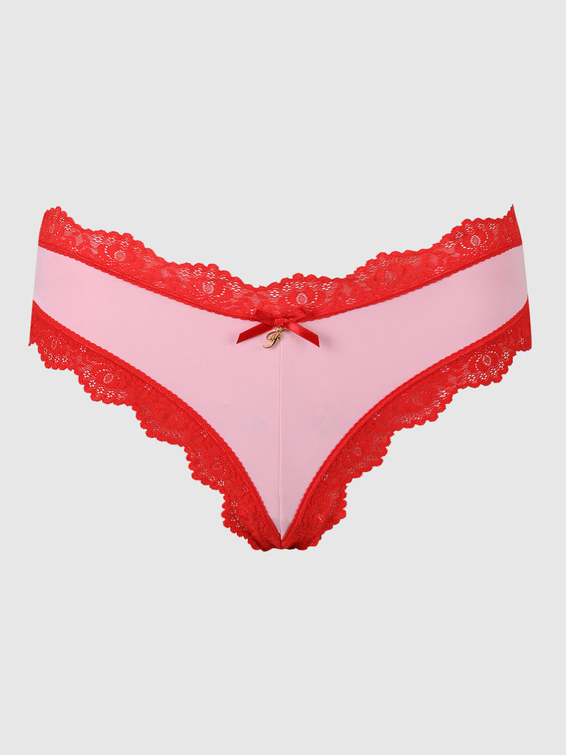 The Jenna Micro G-String by Frederick's of Hollywood features pink silky-soft microfiber, red lace trim, a small red bow, and gold charm at the front center, shown on a plain light gray background.