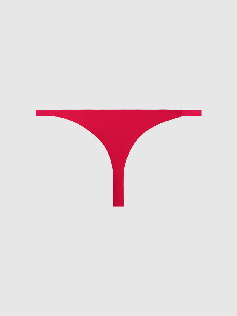 The Frederick's of Hollywood No Show Mid Rise Thong in bright red is shown against a plain light gray background.