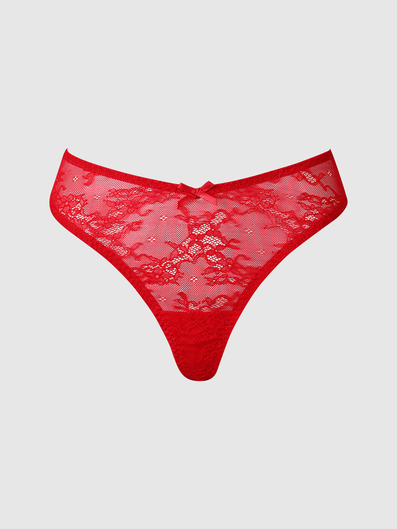 The Frederick’s of Hollywood Marilyn Monroe Lace & Satin Thong features a red floral lace design with a delicate satin bow at the waistband, shown against a simple light gray background.