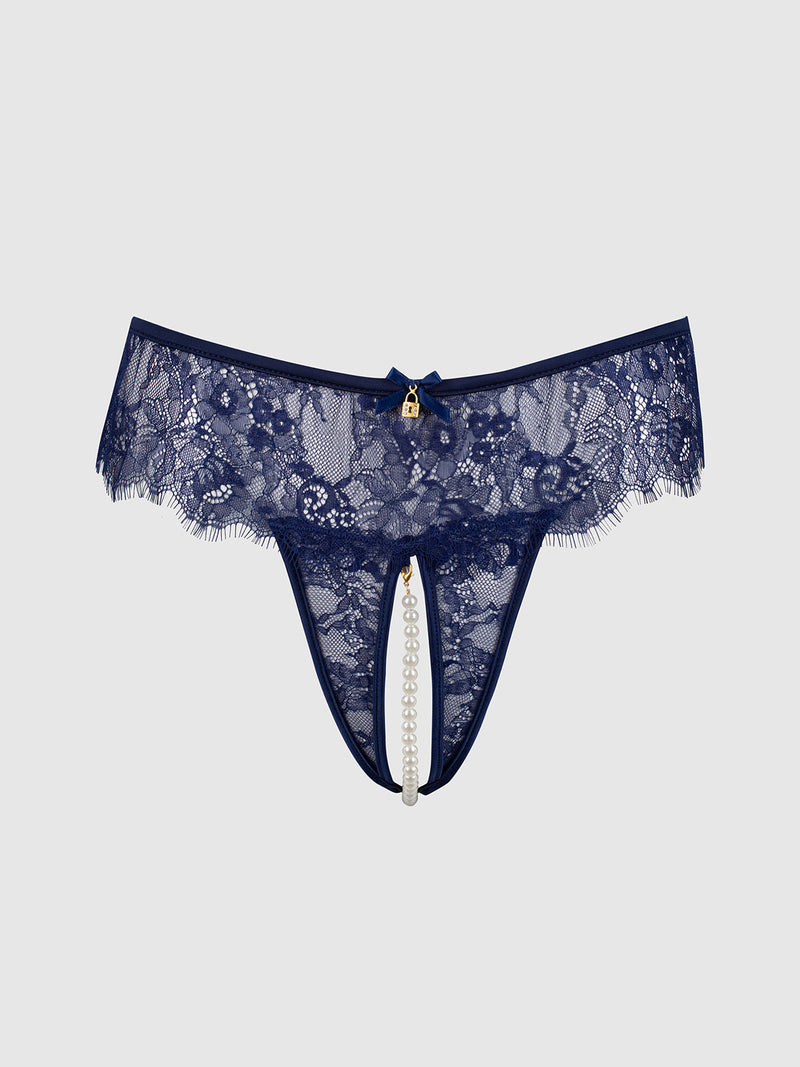 Frederick’s of Hollywood Lilith Lace & Pearl Crotchless Thong in navy blue lace, featuring a gold lock charm at the center front and a string of pearls suspended in the opening.