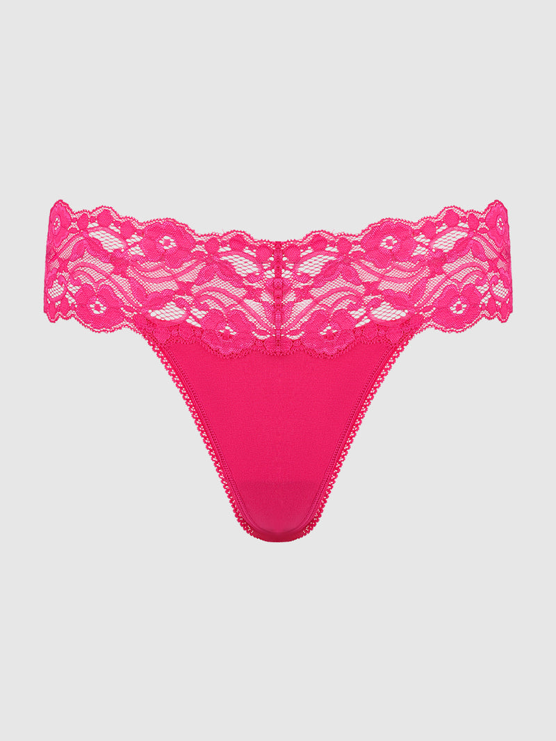 The Bridget Stretch Cotton & Lace Thong by Frederick's of Hollywood features a bright pink floral lace waistband and solid front, offering stylish comfort—shown against a plain light gray background.