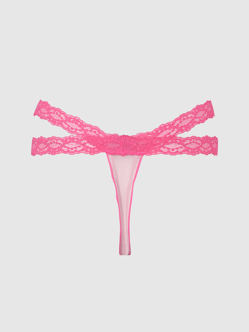 The Stella Mesh & Lace Double Band Thong by Frederick’s of Hollywood, featuring pink lace and a double waistband design, is displayed on a plain light gray background.