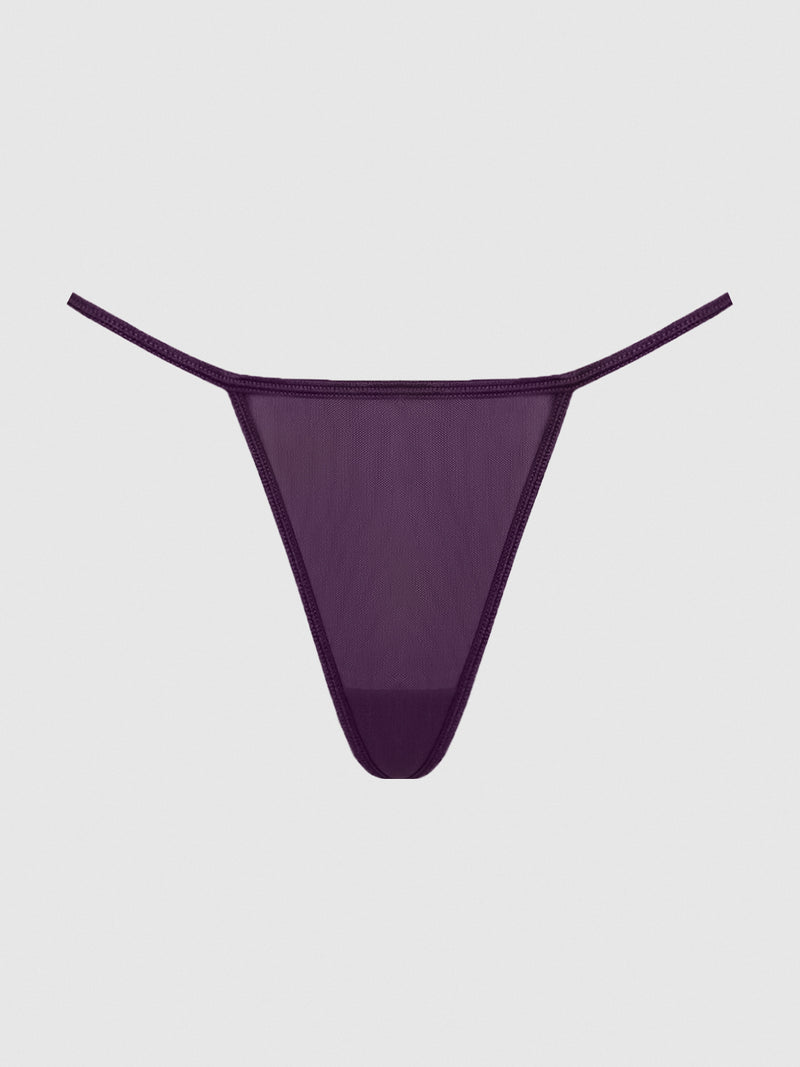 The Frederick's of Hollywood Mesh G-String features sheer deep purple mesh and thin elastic waistband straps, capturing classic allure. Displayed on a plain white background.