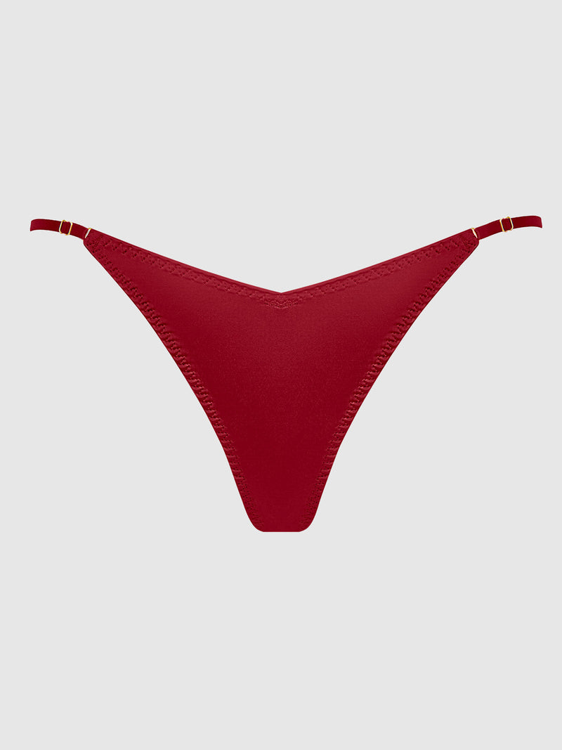 The Frederick's of Hollywood Petra Slider Side Satin Thong features a red V-shaped front and adjustable slider sides for comfort, shown on a plain light gray background.