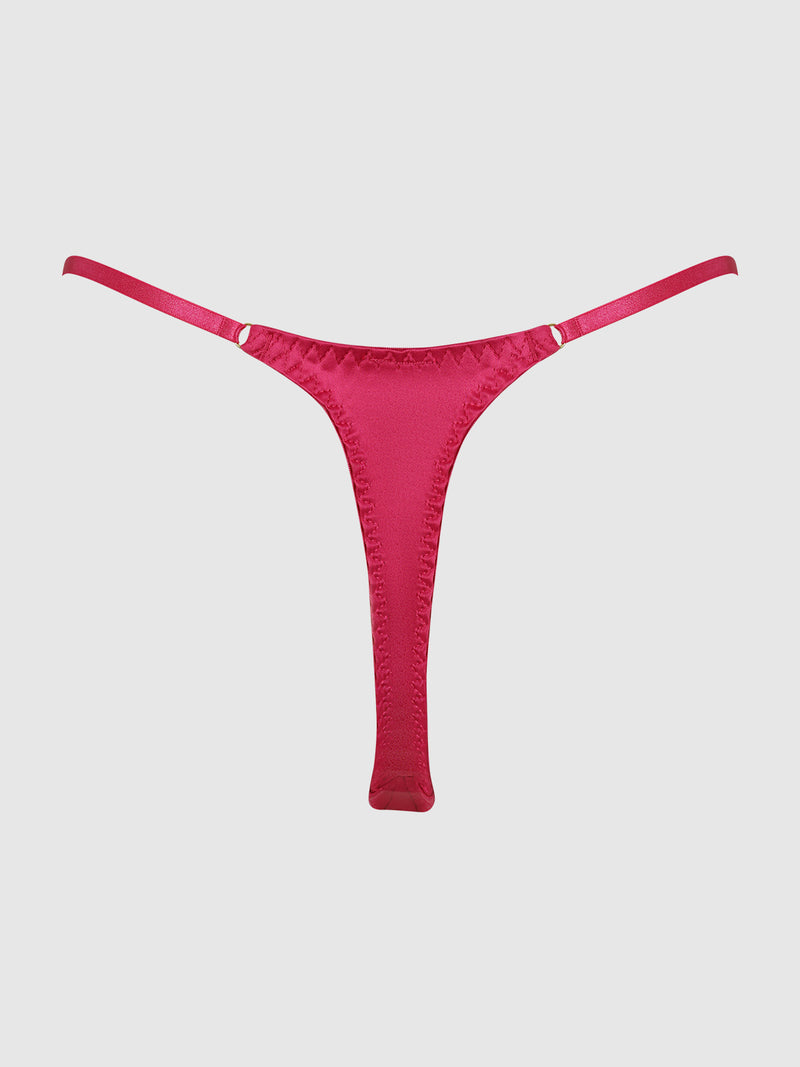 The Frederick's of Hollywood Petra Slider Side Satin Thong features a vibrant pink hue and thin waistband straps, shown against a simple light gray background.