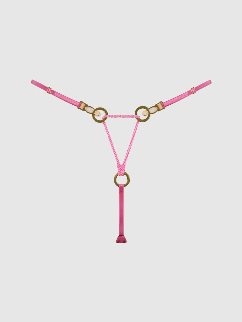 Sure! Here’s a rewritten sentence using the provided product data: The Nadya Liquid Satin & Rope Thong by Frederick’s of Hollywood features pink rope straps with three gold rings arranged in a triangle and adjustable details, displayed on a white background.