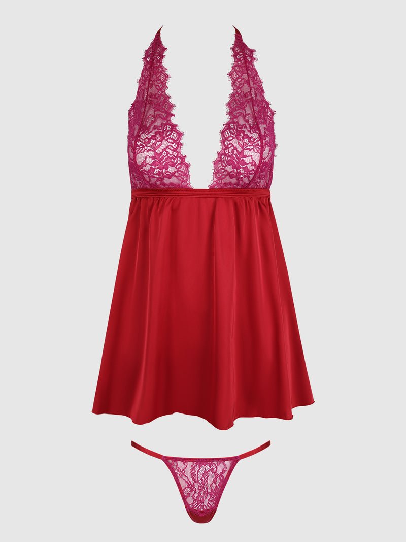 The Frederick's of Hollywood Rosalind Lace & Satin Halter Neck Drop Off Babydoll set features a lace-detailed bust, halter neck dress, and matching thong, displayed on a plain white background.
