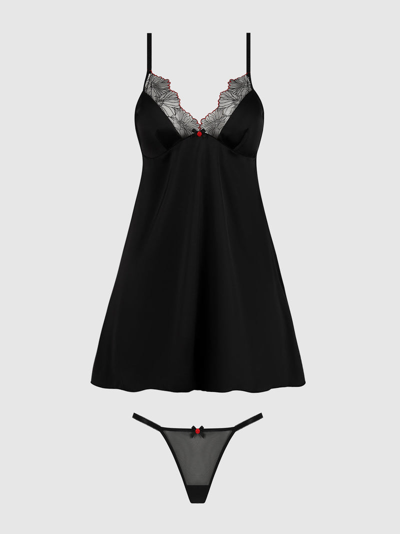 Ilaria Embroidered Tulle Wireless Babydoll Set in black with a sheer lace neckline and matching thong, both detailed with small red heart charms.