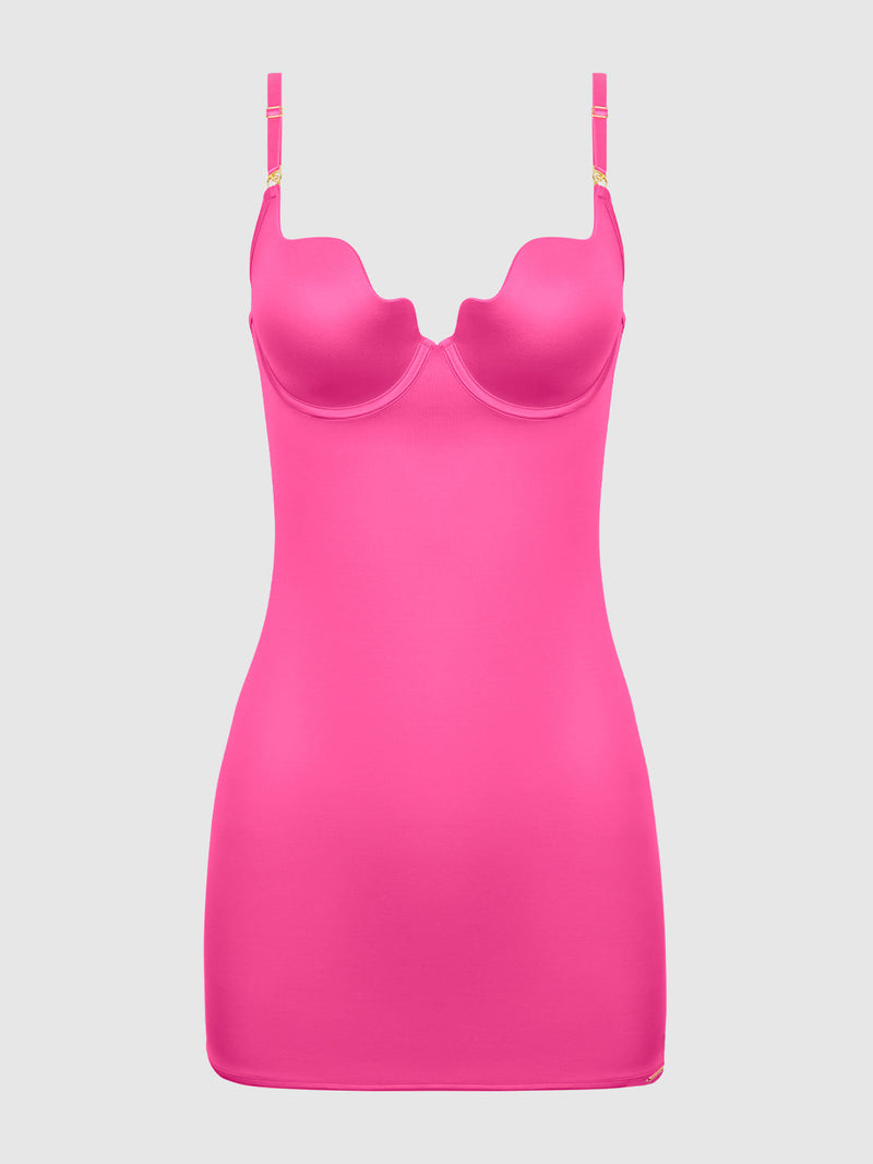 The Director's Cut Liquid Satin Chemise by Frederick's of Hollywood is a bright pink, bodycon mini dress featuring underwire cups and adjustable shoulder straps, shown against a plain light gray background.