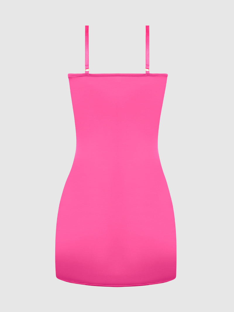 The Director's Cut Liquid Satin Chemise by Frederick's of Hollywood is a bright pink, sleeveless mini dress with spaghetti straps and a bodycon fit, shown on a plain light gray background.