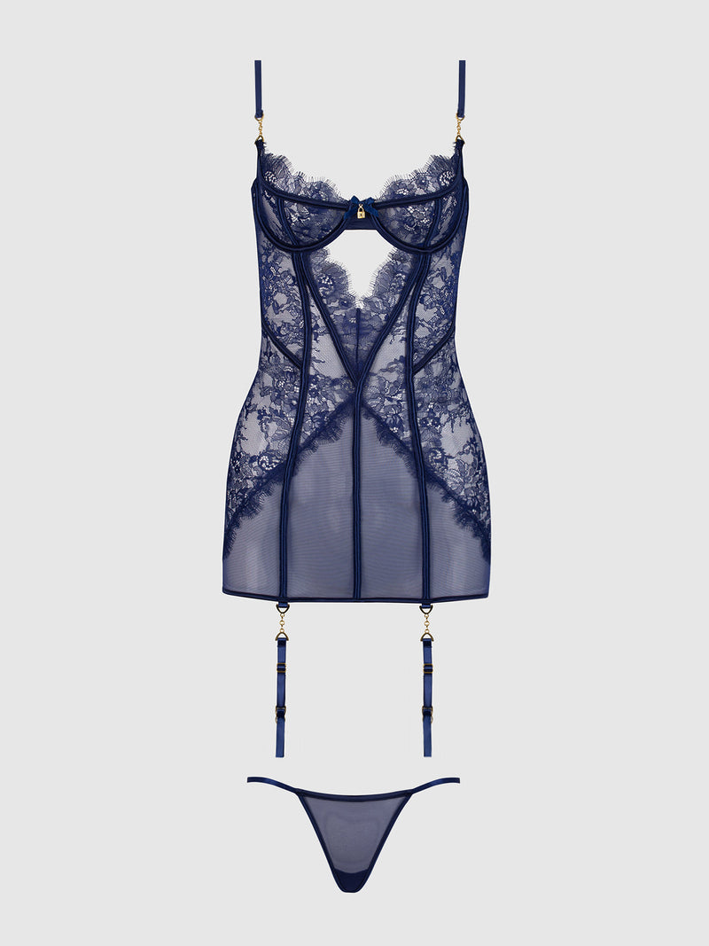 Lilith Lace & Mesh Chemise Set featuring a navy blue lace and mesh chemise with an underwire bodice, attached garter straps, and a matching thong.