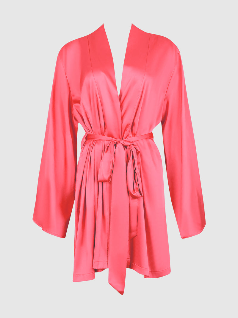 The Petra Satin Short Robe by Frederick’s of Hollywood features a vibrant pink hue, long sleeves, and a matching fabric belt tied at the waist, displayed against a simple light background.