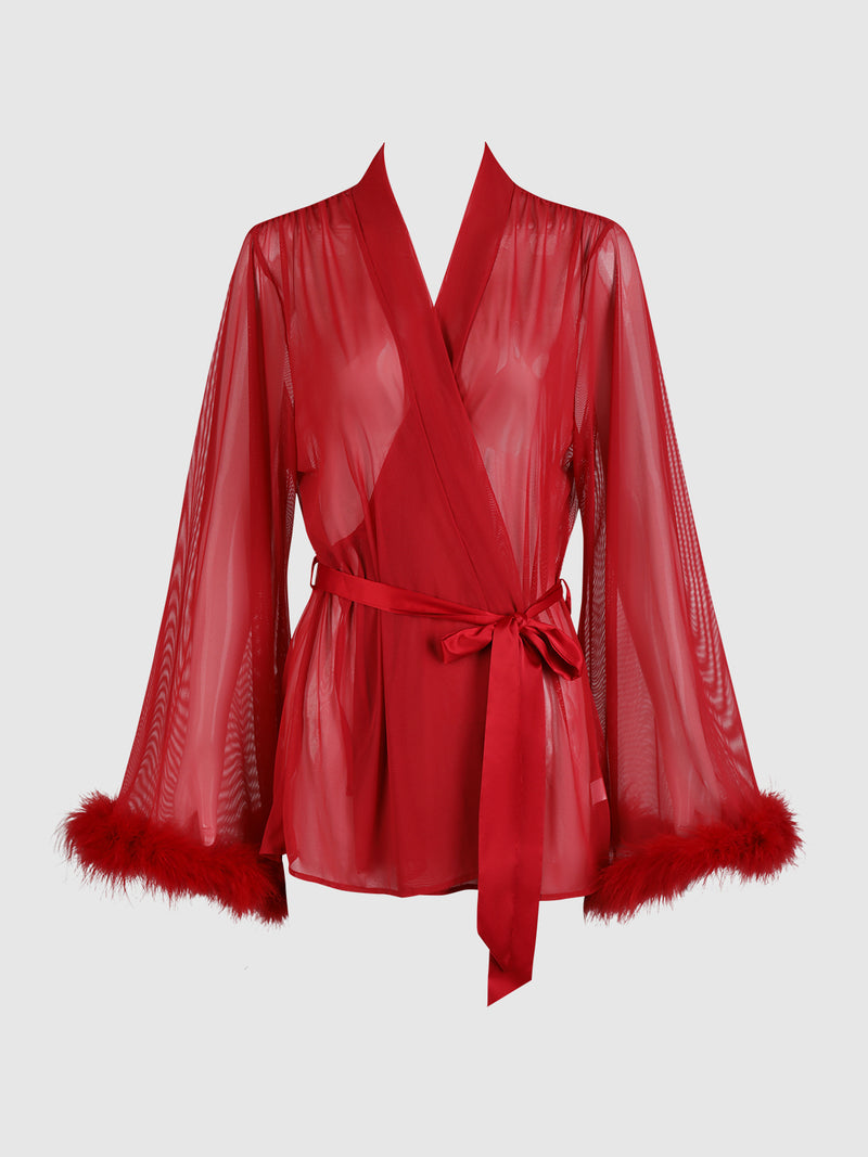 The Scarlett Marabou & Mesh Short Robe by Frederick's of Hollywood is a sheer red robe with long, loose sleeves trimmed in feathers and a deep V-neck. It ties at the waist with a satin belt and is shown on a plain white background.