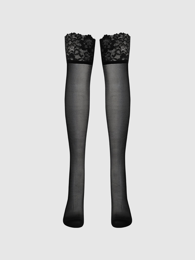 Frederick's of Hollywood Glossy Cross Dye Lace Top Sheer Stay Up Thigh Highs in black, featuring wide floral lace bands, displayed on a plain light gray background.