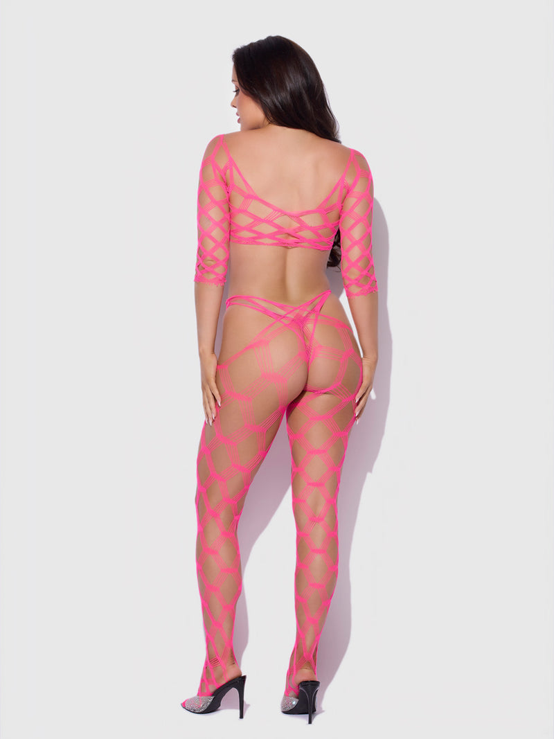 A person seen from behind wears a bright pink, long-sleeved Frederick’s of Hollywood Open Net Bodystocking Set and black high-heeled shoes.