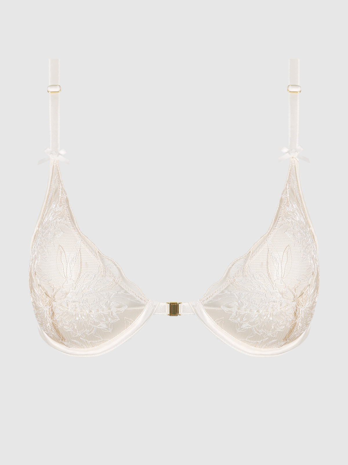The Delfina Embroidered Push Up Half Cup Bra by Frederick's of Hollywood features sheer white lace, floral embroidery, adjustable straps, and a front clasp, shown on a plain light gray background.