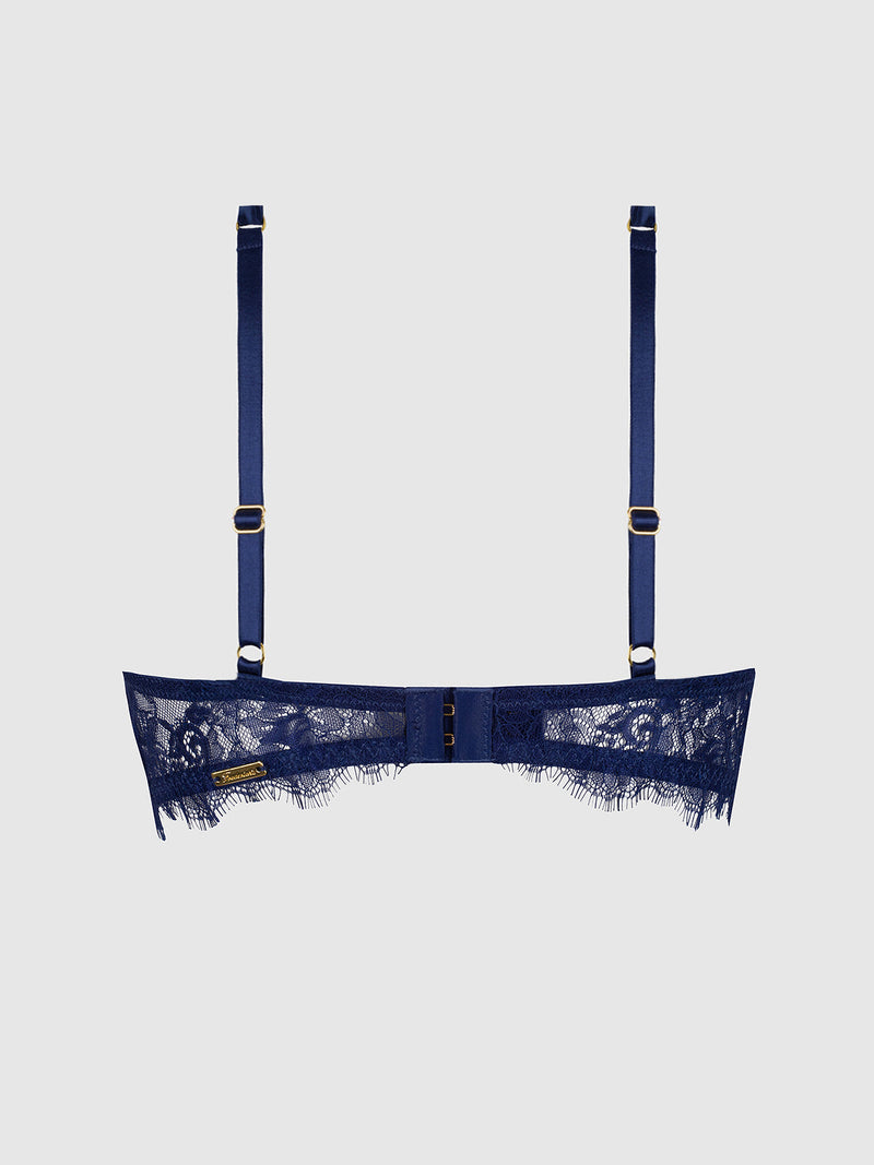 Back view of the Lilith Lace & Mesh V Wire Bra in navy blue, featuring adjustable shoulder straps and a gold-toned metal tag.