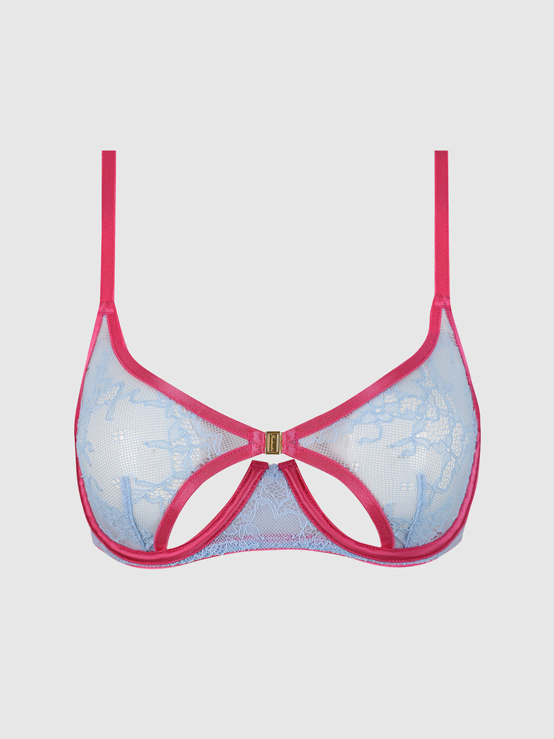 The Pia Lace Unlined Modern Cutout Open Cup Bra by Frederick's of Hollywood features sheer light blue cups with cut-out details, hot pink trim and straps, and a gold charm at the center front.