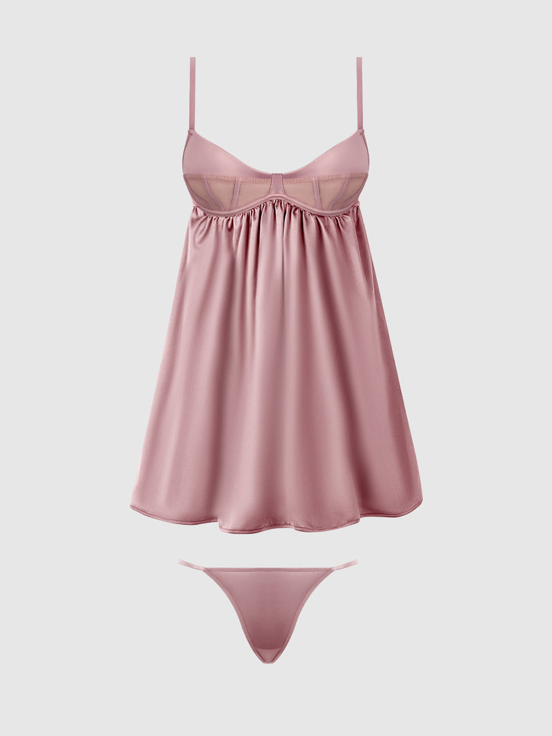 The Petra Satin & Mesh Unlined Corset Cup Babydoll Set by Frederick's of Hollywood is shown in pink, featuring a corset-style bra top with thin straps and a matching thong, displayed on a plain white background.
