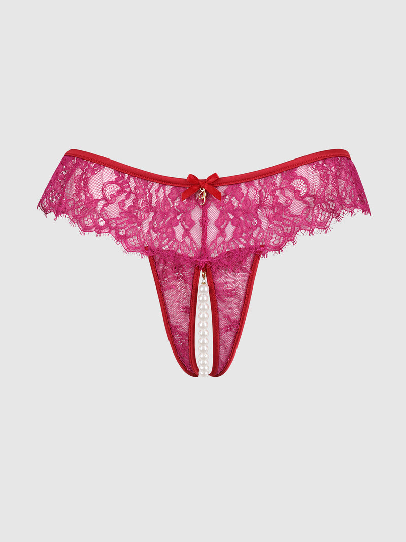 The Rosalind Lace & Pearl Crotchless Thong by Frederick's of Hollywood features red lace, a front bow, and elegant pearl accents in the open center, shown against a plain light background.
