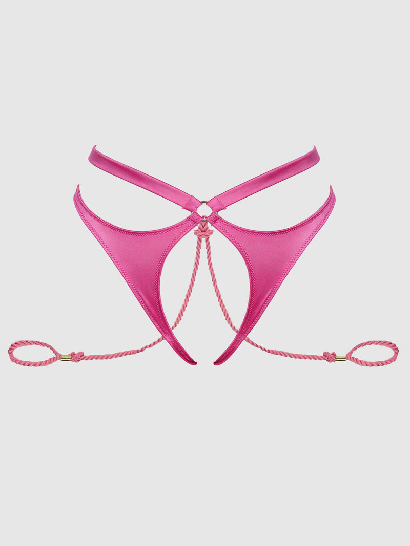 The Nadya Liquid Satin & Rope Crotchless & Hand Cuff Hipster by Frederick’s of Hollywood features a hot pink metallic finish, rope accents, and a cut-out design, showcased against a plain white background.