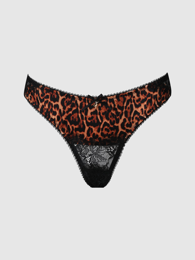 The Raven Leopard And Lace Panty by Frederick's of Hollywood features a leopard print design with black lace trim and a small decorative bow at the center front, as well as a sheer lace panel at the bottom.