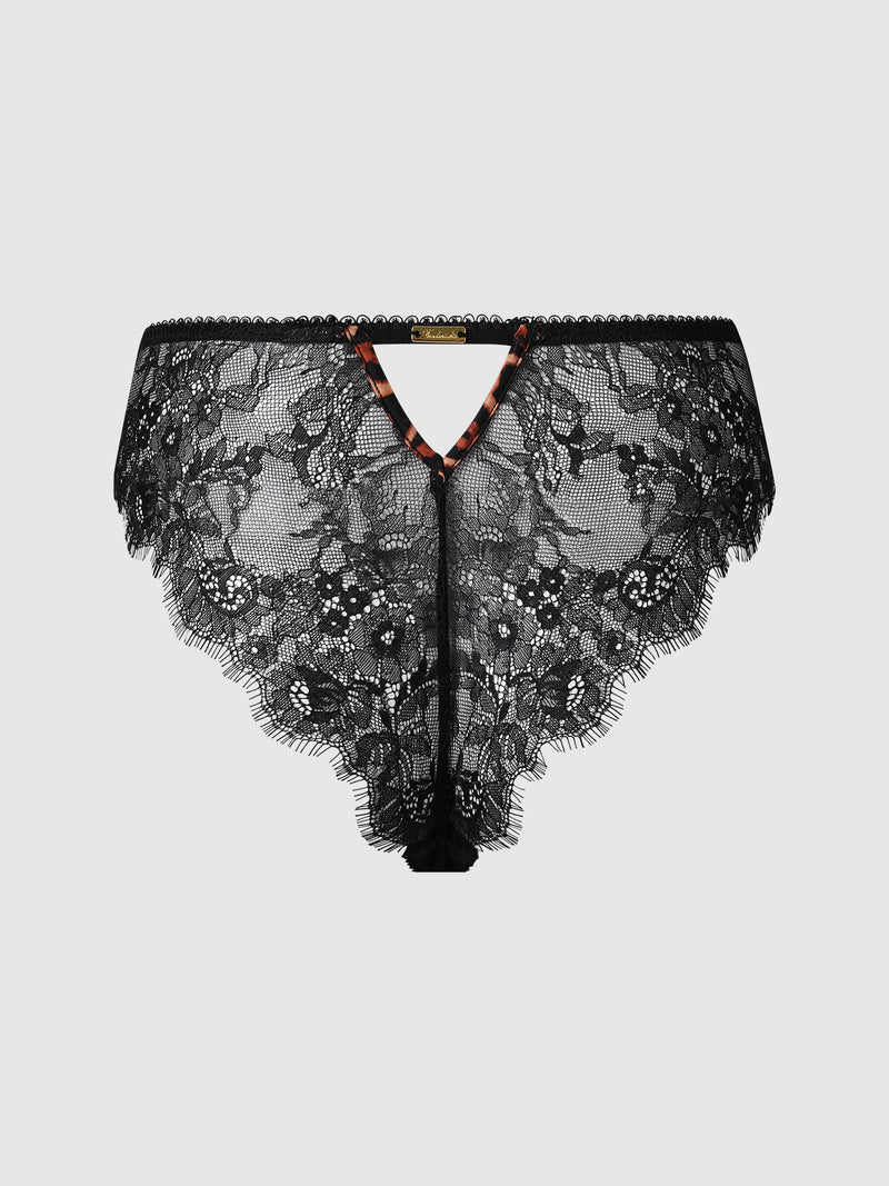 Frederick's of Hollywood Raven Leopard And Lace Panty featuring black lace, a high-waisted design, sheer floral patterns, scalloped edges, and a small tortoiseshell accent at the waistband center.