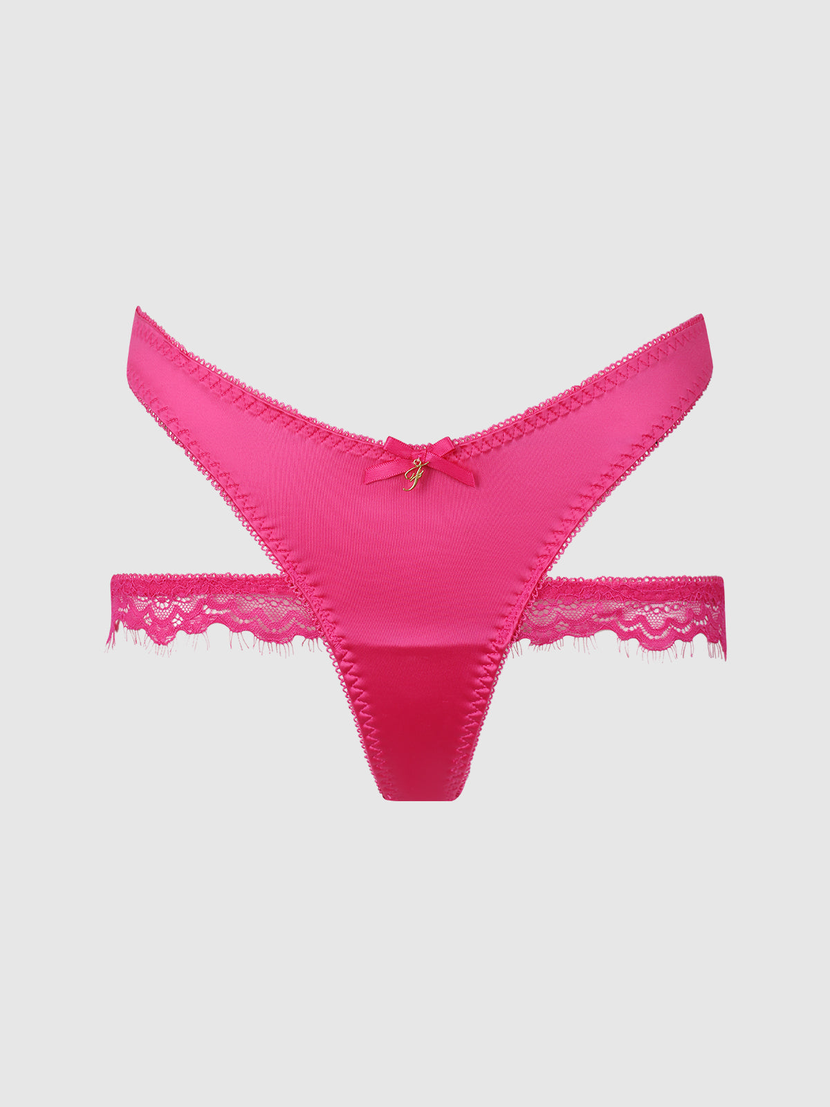 The Neev Lace & Oilslick Strappy Back Tanga by Frederick's of Hollywood features bright pink lace, a center bow, and decorative lace trim on the waistband and leg openings, shown against a plain white background.