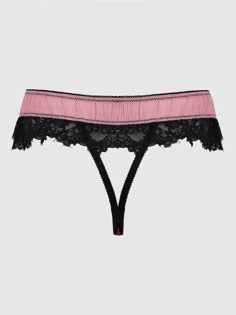 The Frederick’s of Hollywood Esme Pleated Chiffon & Lace Backless Panty features a sheer pink waistband with black lace trim, showcased on a plain white background.