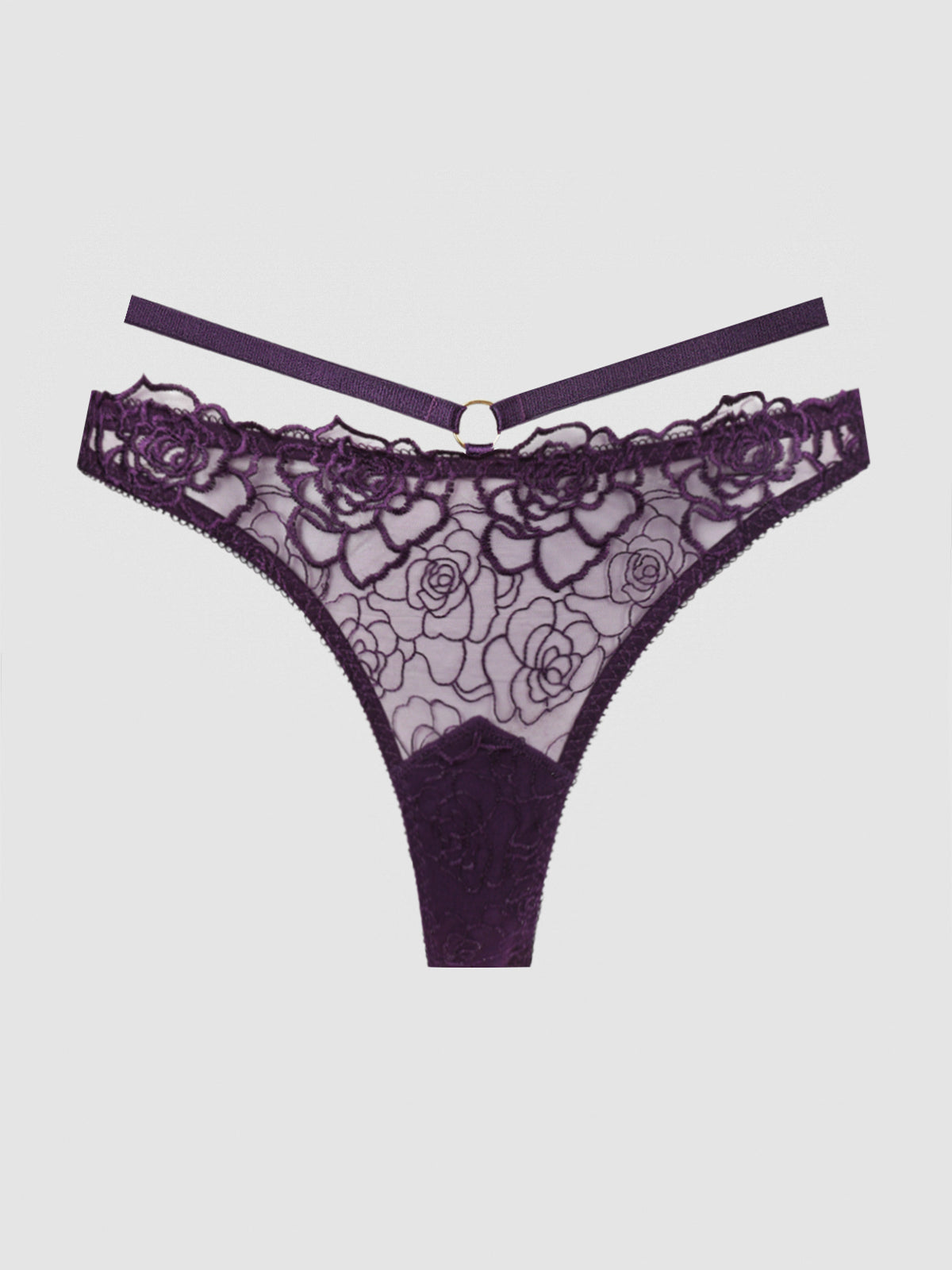 The Melrose Embroidered Tanga by Frederick's of Hollywood is a purple lace thong with floral embroidery, a decorative waistband strap, and central ring detail, displayed on a plain white background.