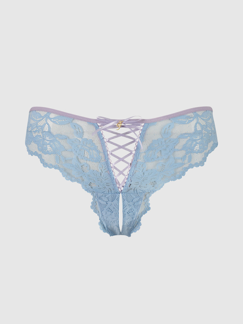 The Mabel Lace Up Front Crotchless Tanga by Frederick's of Hollywood features light blue lace, a lilac waistband, lace-up front ribbon, a central bow, and a delicate semi-sheer design for a feminine touch.