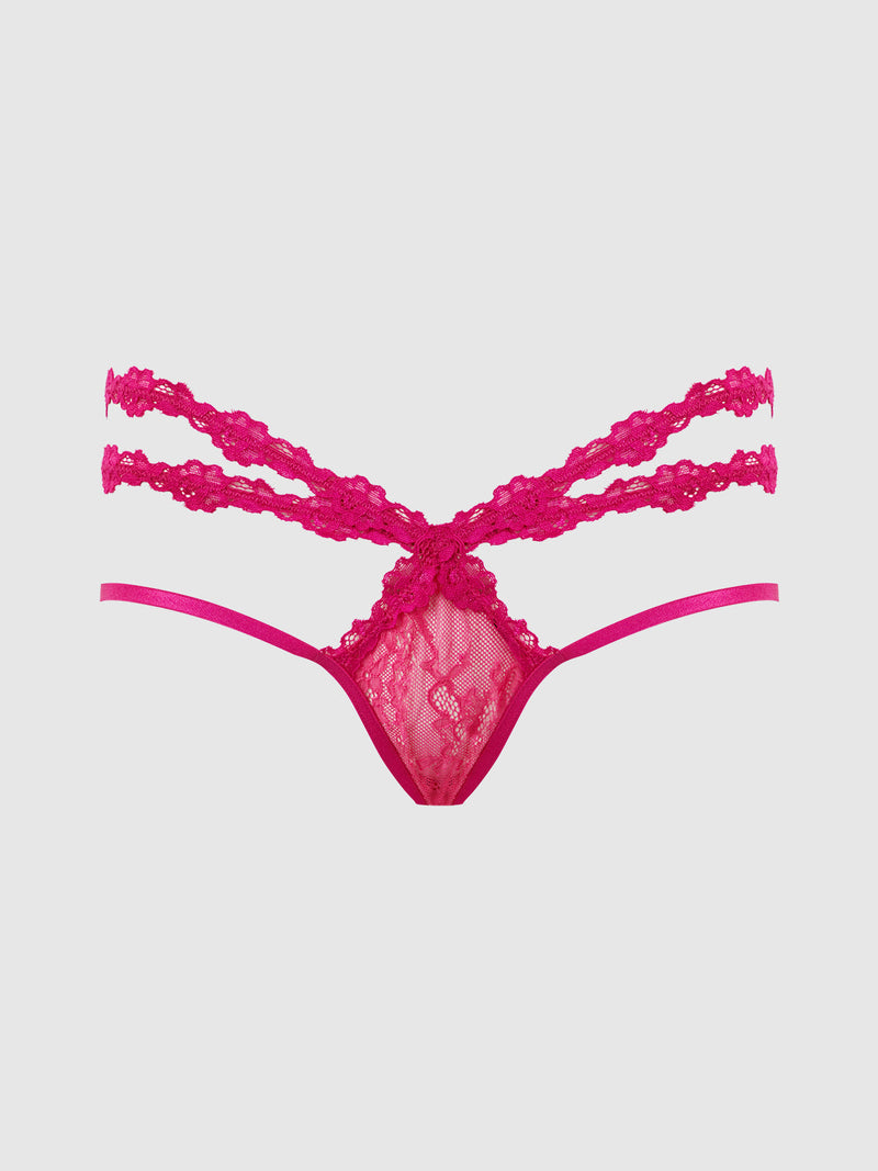 The Pia Lace Strappy Backless Panty by Frederick's of Hollywood features hot pink stretch lace with intricate floral patterns, shown against a plain white background.