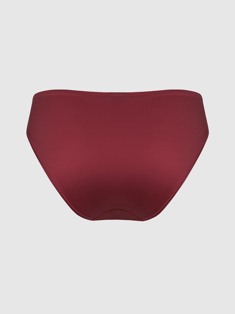 The Lexi Liquid Satin Hipster by Frederick's of Hollywood, a sleek high-waisted maroon bikini bottom, is displayed against a light gray background.