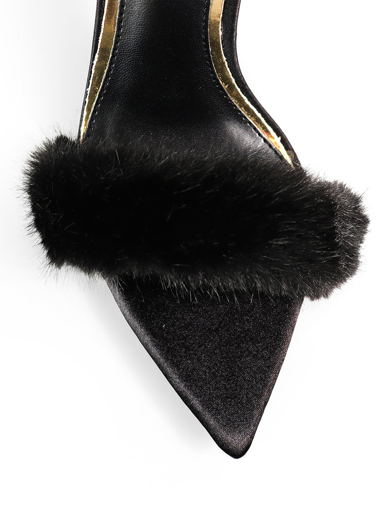 The Aileen Pointed Toe Heel by Frederick's of Hollywood features an elegant pointed toe and black faux fur front strap, accented with a shiny gold trim along the inner edge for a sophisticated, timeless look.