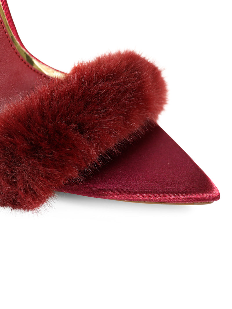 Close-up of the Aileen Pointed Toe Heel by Frederick's of Hollywood, showcasing its burgundy satin finish and plush dark red faux fur trim for timeless style.